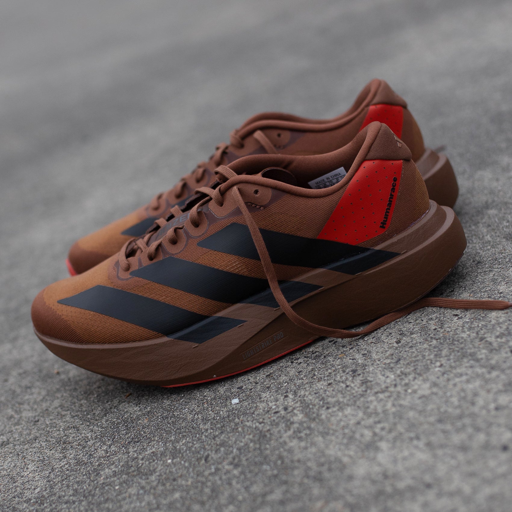 Mens adidas Humanrace Adizero Evo SL by PW | Brown / Carbon Black